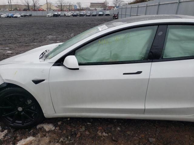 Photo 7 from auction – 2022 TESLA MODEL 3 with VIN 5YJ3E1EB0NF314643