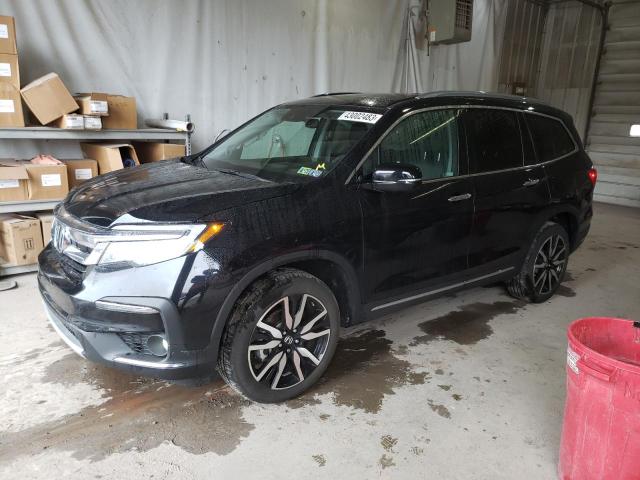 HONDA PILOT TOUR 2021 with VIN 5FNYF6H95MB090549 - Photo from auction