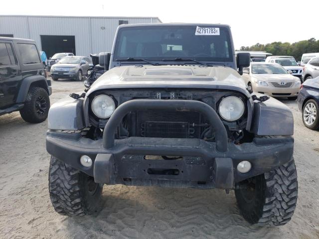 Photo 5 from auction – 2014 JEEP WRANGLER U with VIN 1C4BJWFG2EL274867