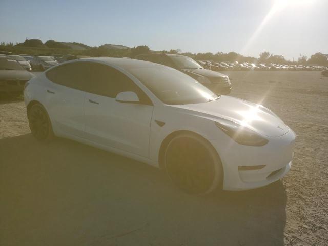 Photo 4 from auction – 2021 TESLA MODEL 3 with VIN 5YJ3E1EC5MF027676