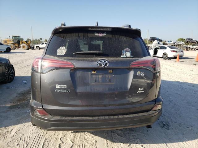 Photo 6 from auction – 2018 TOYOTA RAV4 LE with VIN JTMBFREV5JJ179924