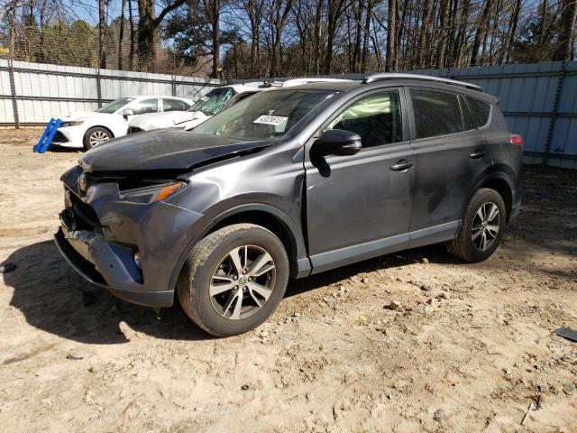 TOYOTA RAV4 XLE 2017 with VIN JTMWFREV9HJ717696 - Photo from auction