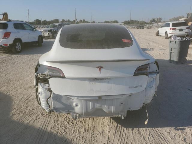 Photo 6 from auction – 2021 TESLA MODEL 3 with VIN 5YJ3E1EC5MF027676