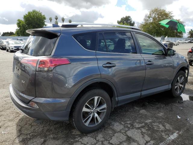 Photo 3 from auction – 2016 TOYOTA RAV4 XLE with VIN JTMWFREV6GJ097579