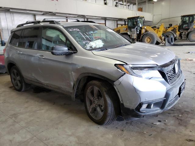 Photo 4 from auction – 2021 HONDA PASSPORT T with VIN 5FNYF8H98MB029577
