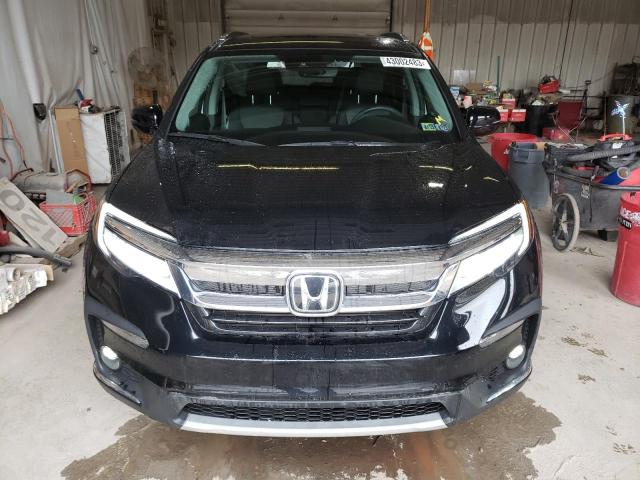 Photo 5 from auction – 2021 HONDA PILOT TOUR with VIN 5FNYF6H95MB090549