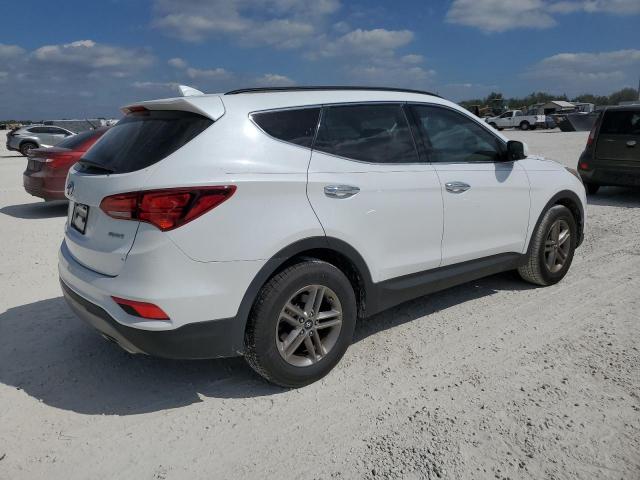 Photo 3 from auction – 2017 HYUNDAI SANTA FE S with VIN 5NMZU3LB0HH002482