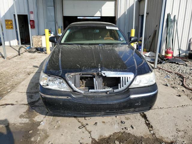 Photo 5 from auction – 2004 LINCOLN TOWN CAR U with VIN 1LNHM83W64Y688952