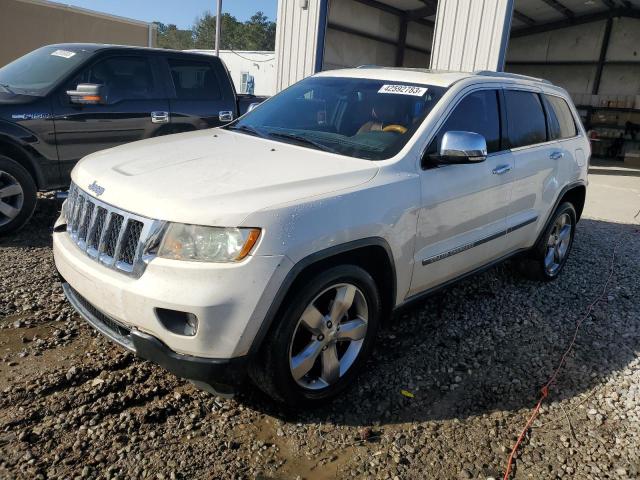 JEEP GRAND CHER 2011 with VIN 1J4RS6GG2BC739583 - Photo from auction