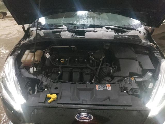 Photo 11 from auction – 2015 FORD FOCUS TITA with VIN 1FADP3J29FL313169