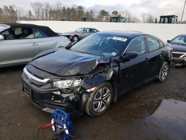 HONDA CIVIC LX 2018 with VIN 2HGFC2F57JH604952 - Photo from auction