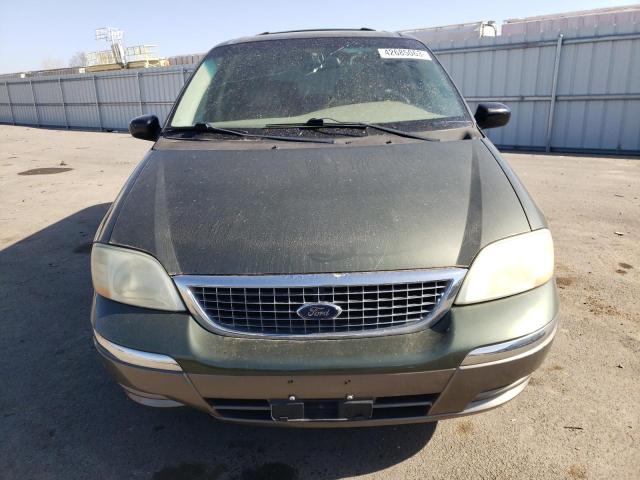 Photo 5 from auction – 2003 FORD WINDSTAR with VIN 2FMDA53463BB56181
