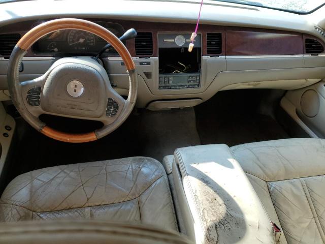 Photo 8 from auction – 2004 LINCOLN TOWN CAR U with VIN 1LNHM83W64Y688952