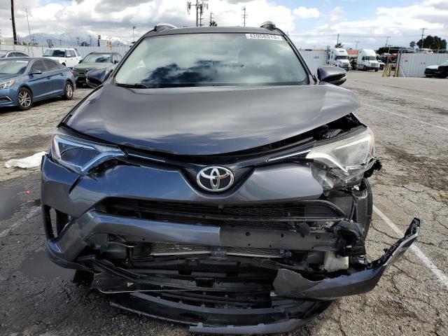 Photo 5 from auction – 2016 TOYOTA RAV4 XLE with VIN JTMWFREV6GJ097579