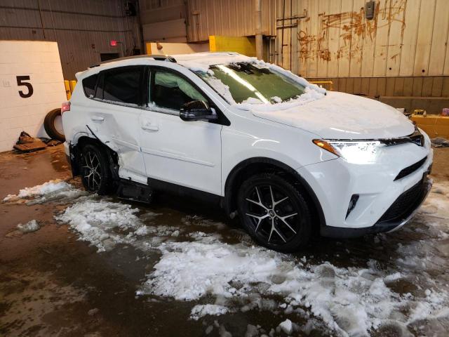 Photo 4 from auction – 2016 TOYOTA RAV4 SE with VIN JTMJFREV9GJ074517