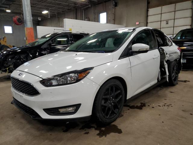 FORD FOCUS SE 2016 with VIN 1FADP3F25GL387649 - Photo from auction