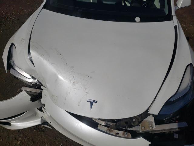 Photo 11 from auction – 2020 TESLA MODEL 3 with VIN 5YJ3E1EB7LF712624