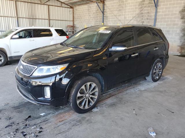 KIA SORENTO 2014 with VIN 5XYKW4A71EG444063 - Photo from auction