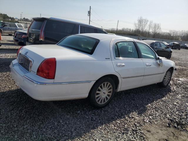 Photo 3 from auction – 2004 LINCOLN TOWN CAR E with VIN 1LNHM81W54Y659770