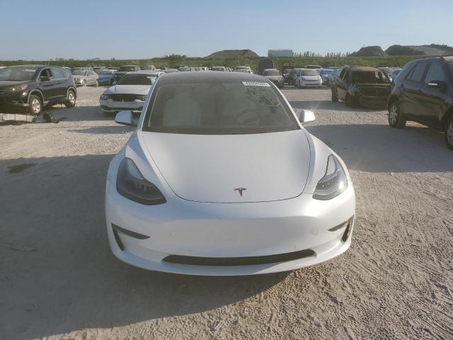 Photo 5 from auction – 2021 TESLA MODEL 3 with VIN 5YJ3E1EC5MF027676