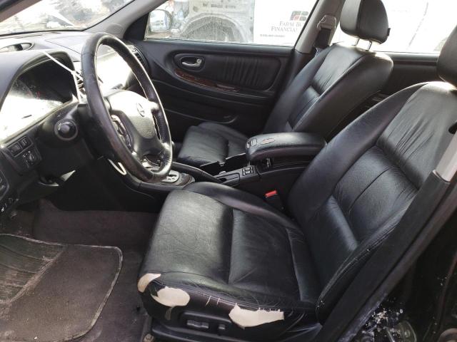 Photo 7 from auction – 2002 NISSAN MAXIMA GLE with VIN JN1DA31AX2T305257