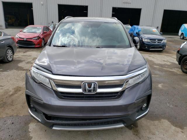 Photo 5 from auction – 2022 HONDA PILOT TOUR with VIN 5FNYF5H95NB017158