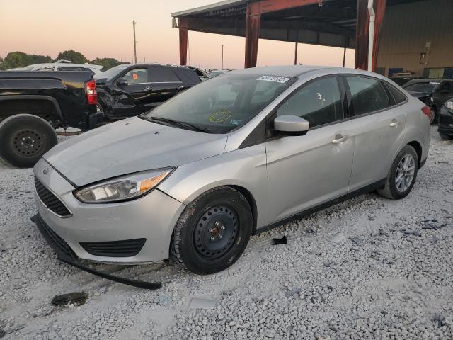 FORD FOCUS SE 2018 with VIN 1FADP3F23JL279716 - Photo from auction