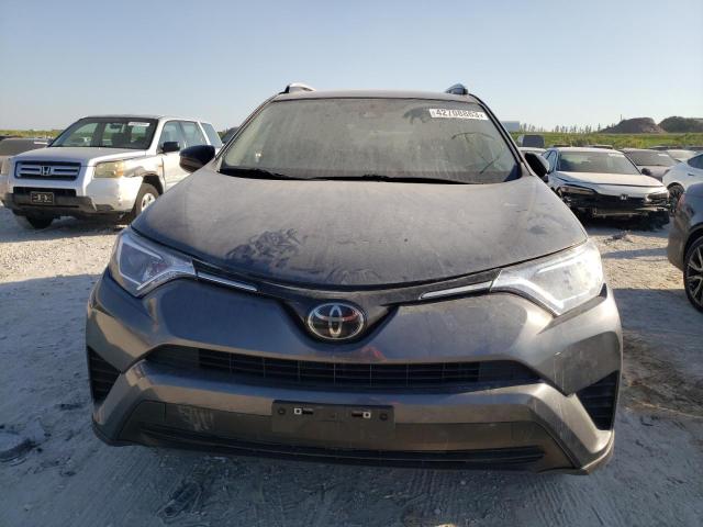 Photo 5 from auction – 2018 TOYOTA RAV4 LE with VIN JTMBFREV5JJ179924