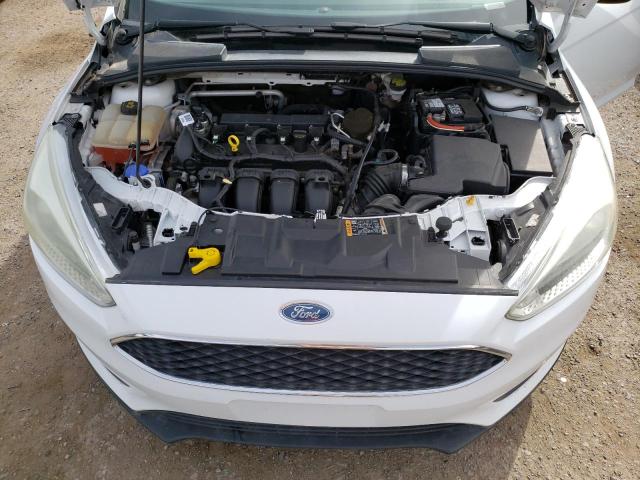 Photo 11 from auction – 2015 FORD FOCUS SE with VIN 1FADP3F25FL261919