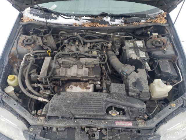 Photo 11 from auction – 2003 MAZDA PROTEGE DX with VIN JM1BJ225631211194