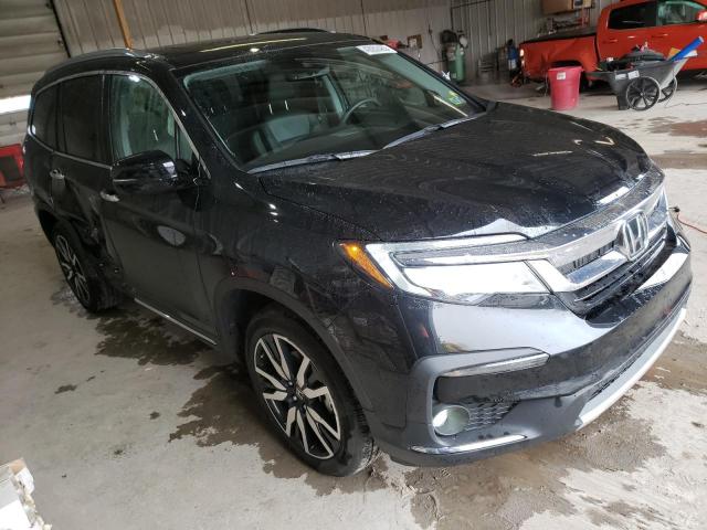 Photo 4 from auction – 2021 HONDA PILOT TOUR with VIN 5FNYF6H95MB090549