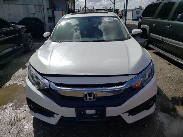 Photo 5 from auction – 2018 HONDA CIVIC EX with VIN JHMFC1F30JX030261