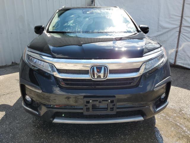 Photo 5 from auction – 2021 HONDA PILOT ELIT with VIN 5FNYF6H04MB069175