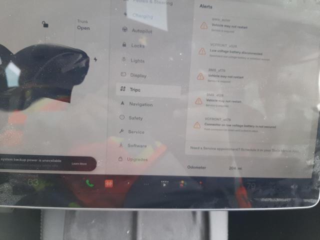 Photo 9 from auction – 2023 TESLA MODEL 3 with VIN 5YJ3E1EA1PF459197