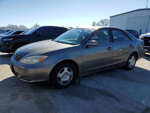 TOYOTA CAMRY LE 2003 with VIN JTDBE32KX30193689 - Photo from auction