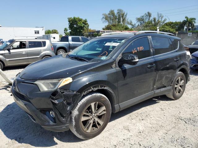 TOYOTA RAV4 XLE 2017 with VIN 2T3WFREV8HW323995 - Photo from auction