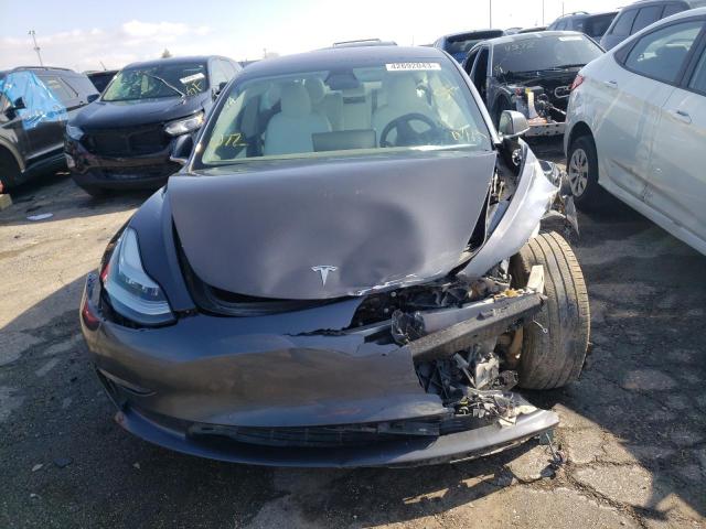 Photo 5 from auction – 2018 TESLA MODEL 3 with VIN 5YJ3E1EB4JF096054