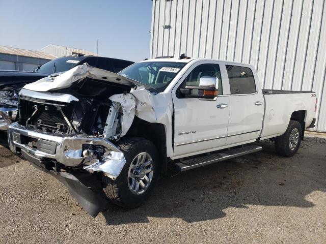 CHEVROLET SILVERADO 2018 with VIN 1GC4K0CY0JF140383 - Photo from auction