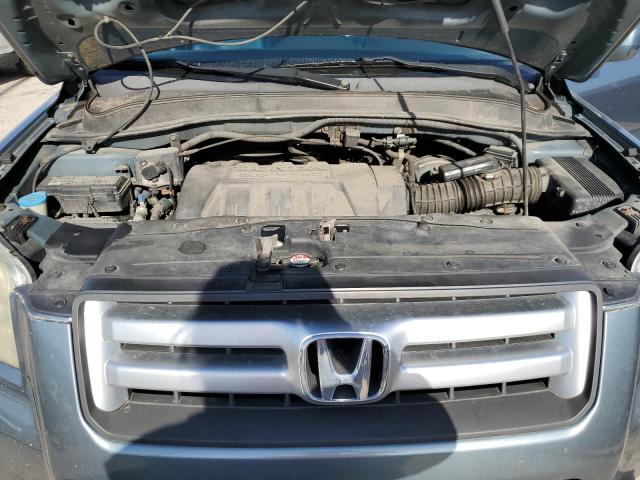Photo 12 from auction – 2006 HONDA PILOT EX with VIN 2HKYF18526H561531
