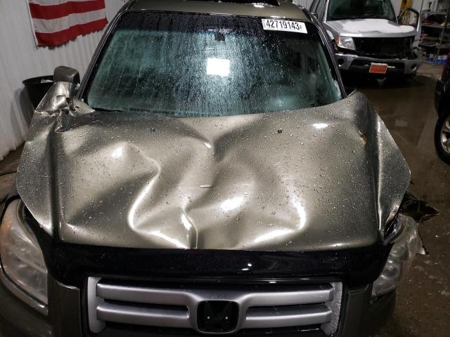 Photo 11 from auction – 2006 HONDA PILOT EX with VIN 5FNYF18626B024858