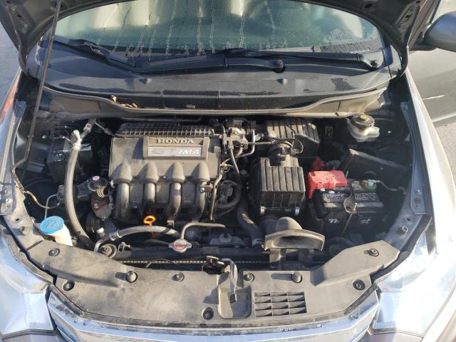 Photo 11 from auction – 2014 HONDA INSIGHT LX with VIN JHMZE2H58ES003324