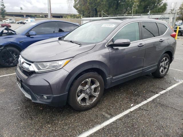 HONDA CR-V EX 2018 with VIN 5J6RW1H55JA012579 - Photo from auction