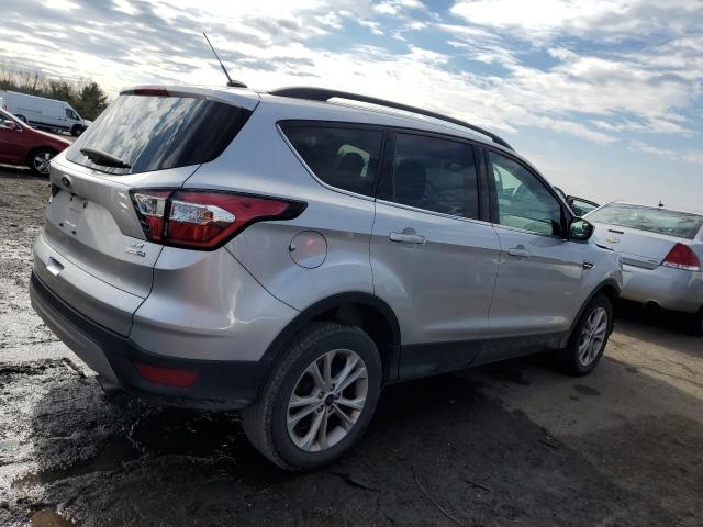 Photo 3 from auction – 2018 FORD ESCAPE SE with VIN 1FMCU9GD5JUC25860
