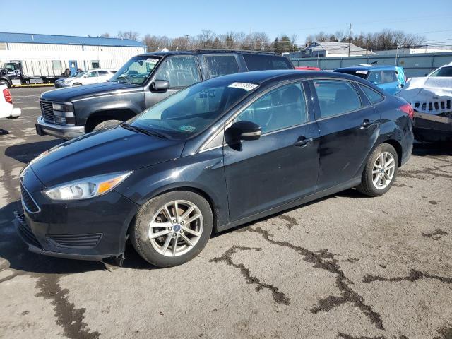 FORD FOCUS SE 2016 with VIN 1FADP3F26GL381066 - Photo from auction