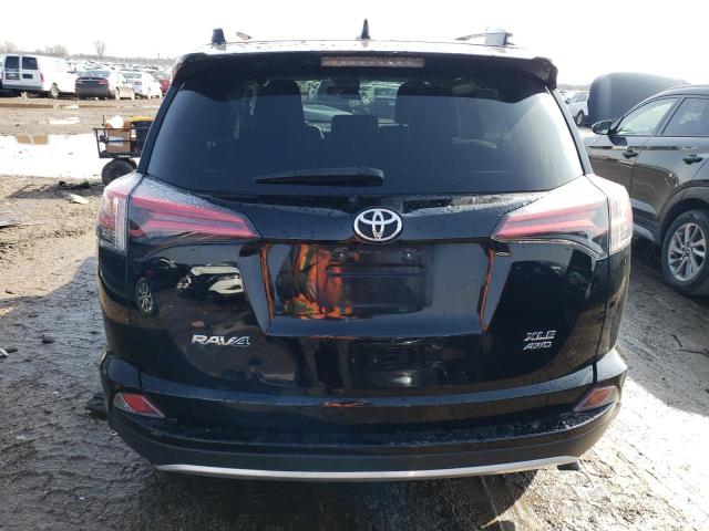 Photo 6 from auction – 2016 TOYOTA RAV4 XLE with VIN 2T3RFREVXGW410700