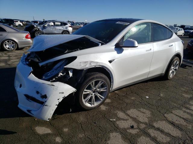 TESLA MODEL Y 2022 with VIN 7SAYGDEE2NF404178 - Photo from auction