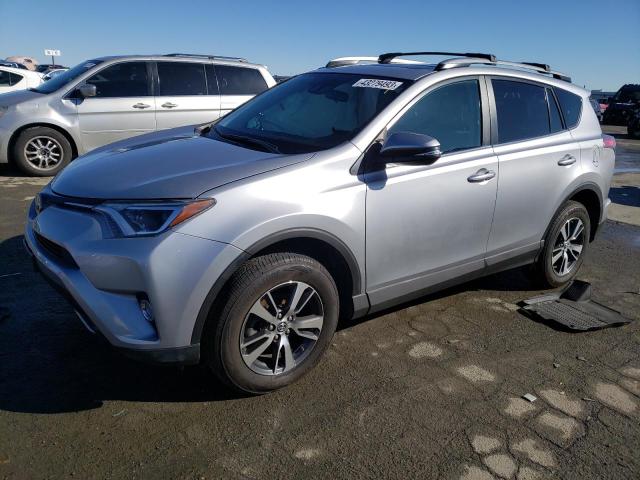 TOYOTA RAV4 XLE 2017 with VIN 2T3RFREV3HW659485 - Photo from auction