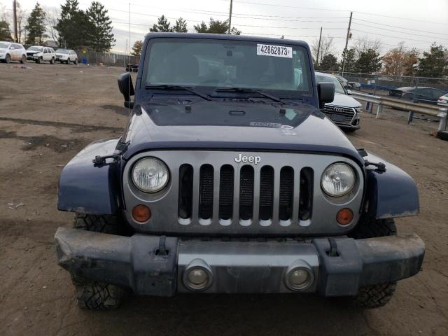 Photo 5 from auction – 2012 JEEP WRANGLER U with VIN 1C4BJWDG4CL289371