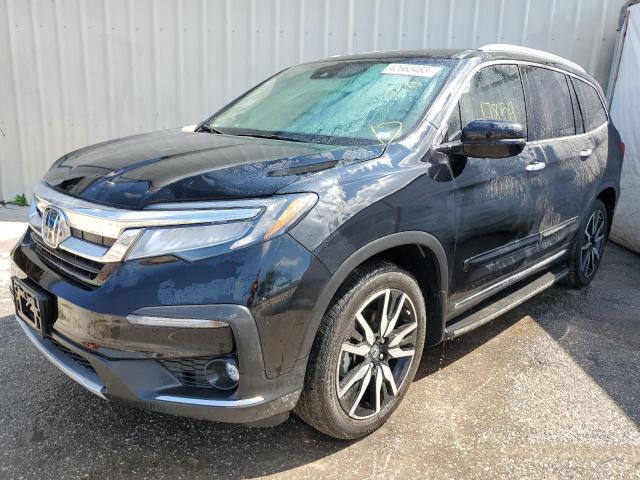 HONDA PILOT ELIT 2021 with VIN 5FNYF6H04MB069175 - Photo from auction