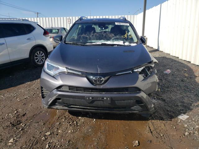 Photo 5 from auction – 2018 TOYOTA RAV4 LE with VIN JTMBFREV6JJ728997